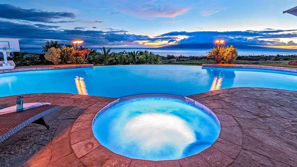 Next to the hot tub and pool by Maui luxury property Pacific View