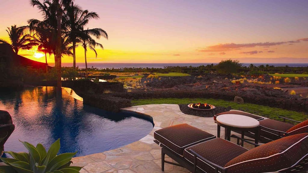 Sunset by Poolside of Big Island luxury property Laueki Estate