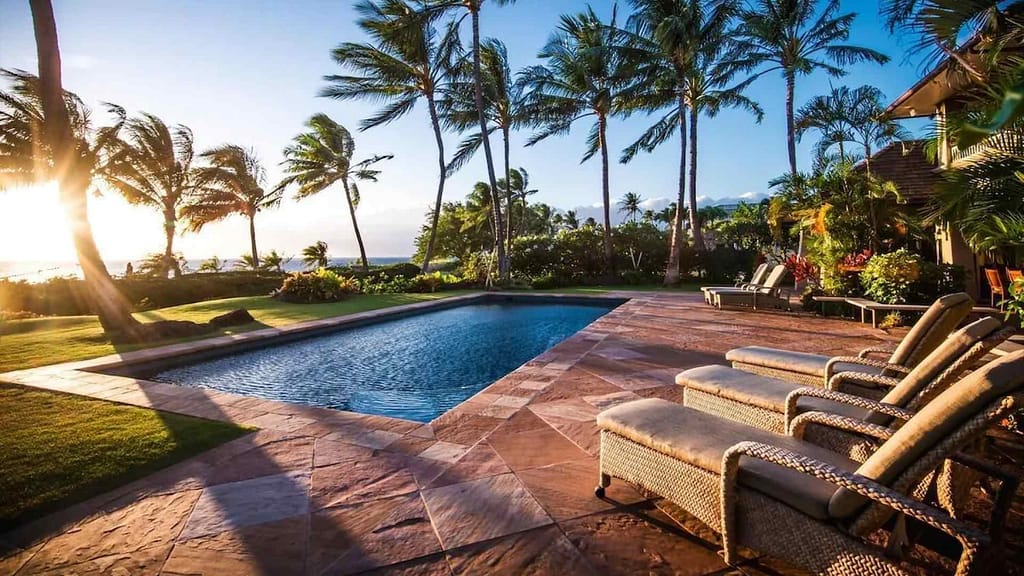 pool and Plantation style architecture  view from Maui luxury property Hoku Kai Hale