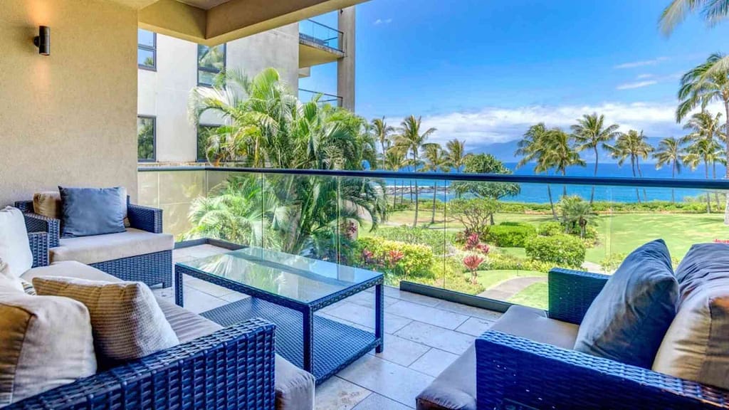 Outside deck with ocean view of Maui Luxury property Kapalua Ikena